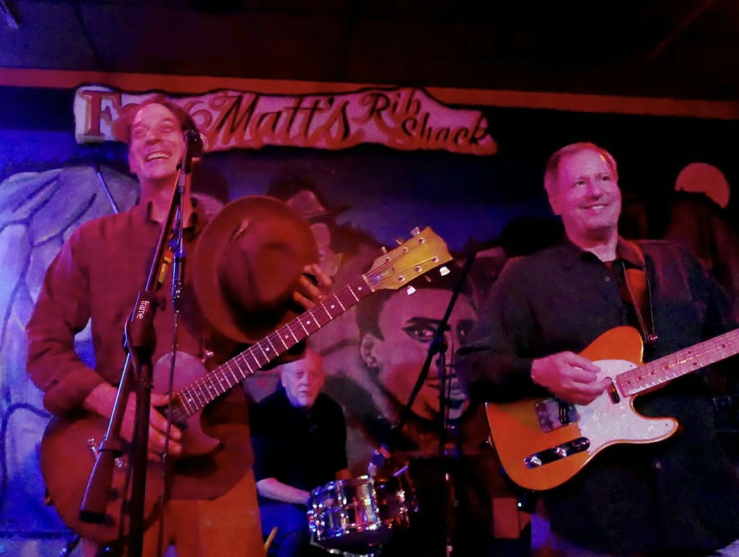 Joe Caporaso playing guitar live