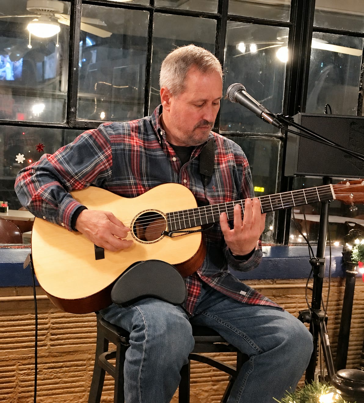 Joe Caporaso playing acoustic guitar